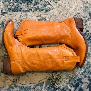 Frye leather cowgirl boots in orange sunrise